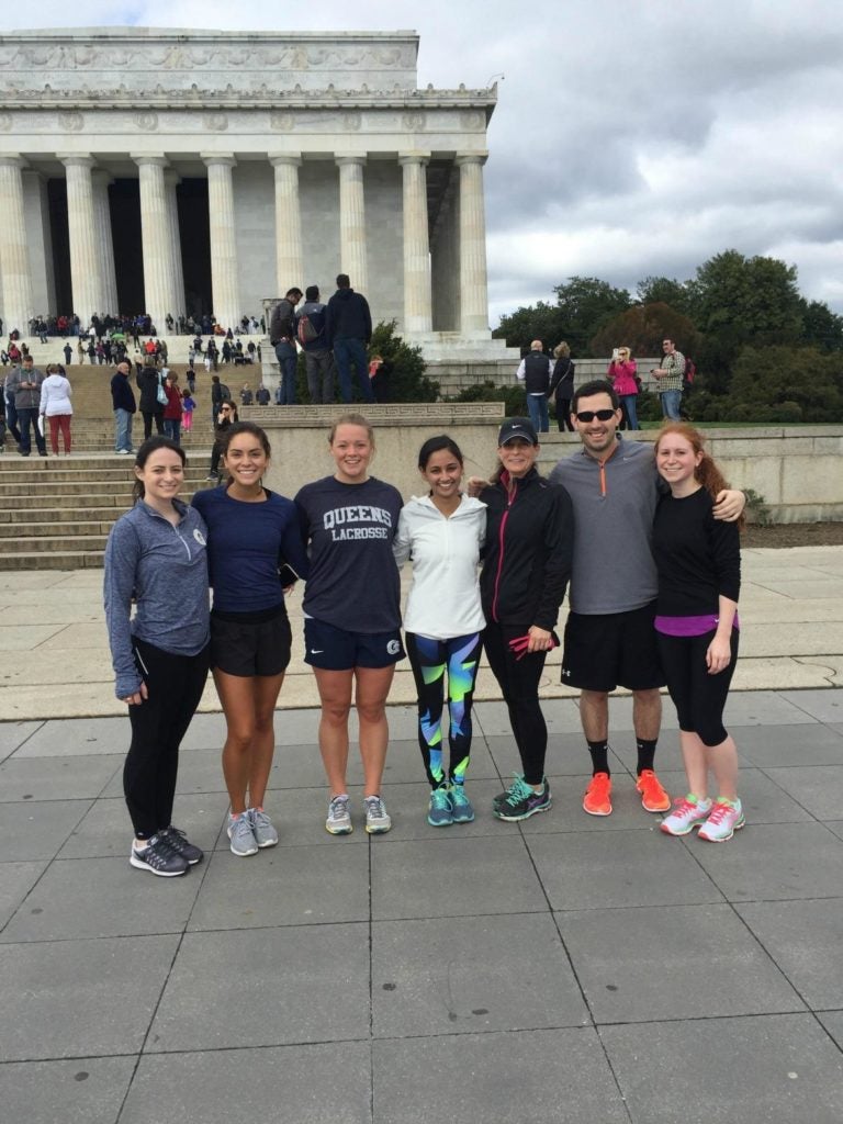 photo of 7 students from a Knowlan event, standing in front of the Lincoln Memorial, Washington DC