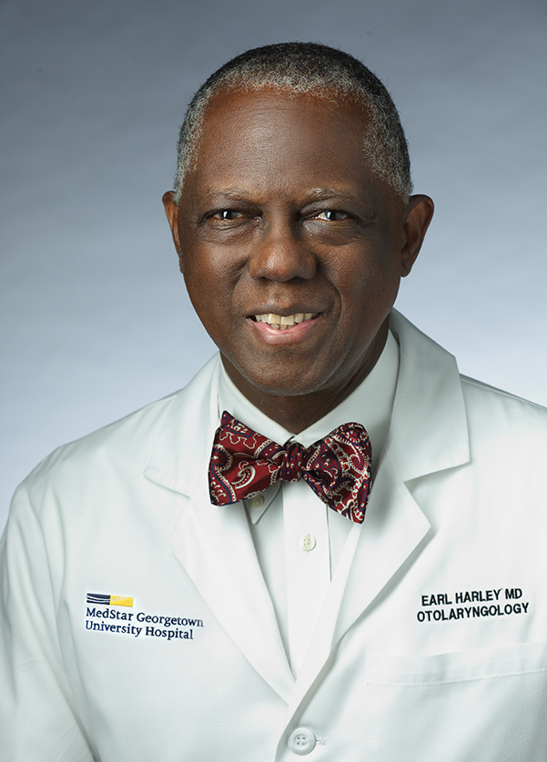 Dr. Earl Harley in white coat