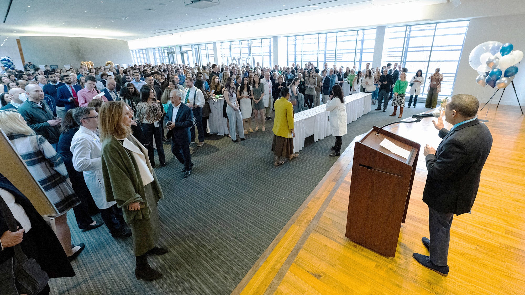 A view of the room croweded with people on Match Day
