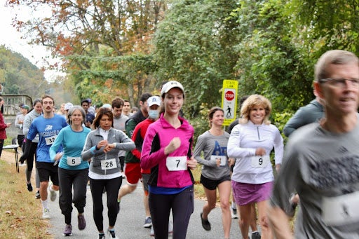 Runners leave the starting line