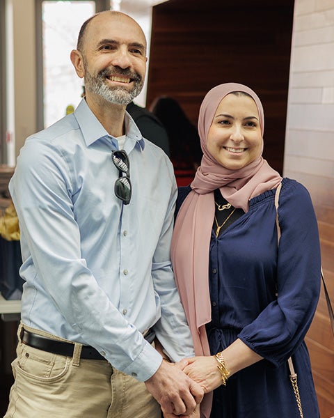 Ruba Omeira and husband stand together