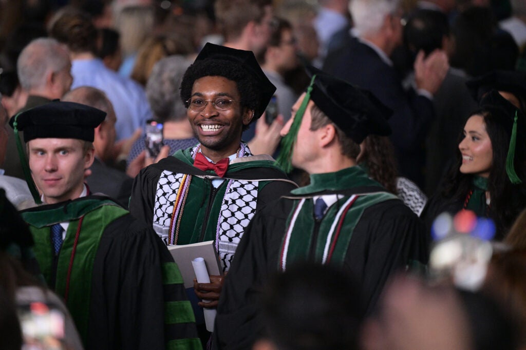 Students exit the venue smiling broadly