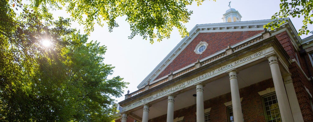 The facade of the brick Medical-Dental building on campus