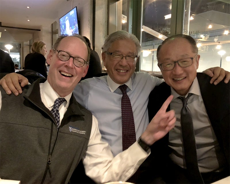 Dr. Farmer, Dr. Dzau, and Dr. Kim sit next to each other