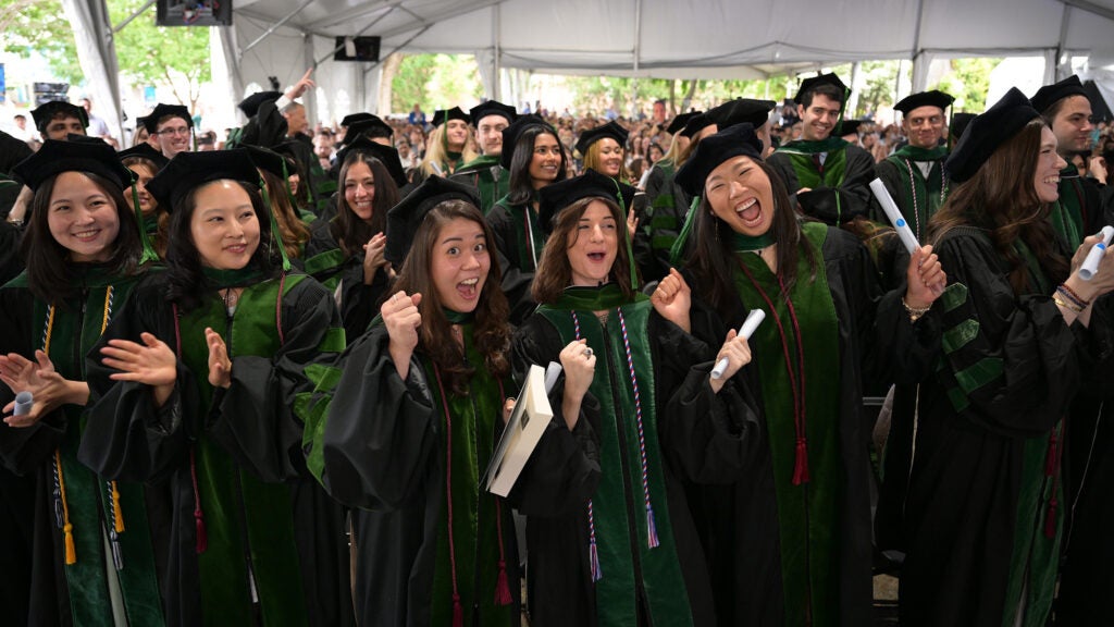 Jubilant students celebrate earning their medical degrees