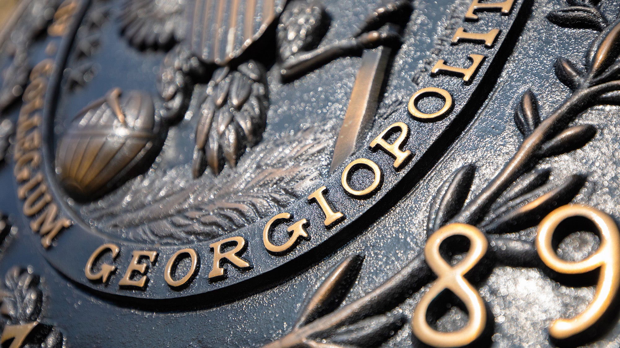 Details of the Georgetown seal in bronze