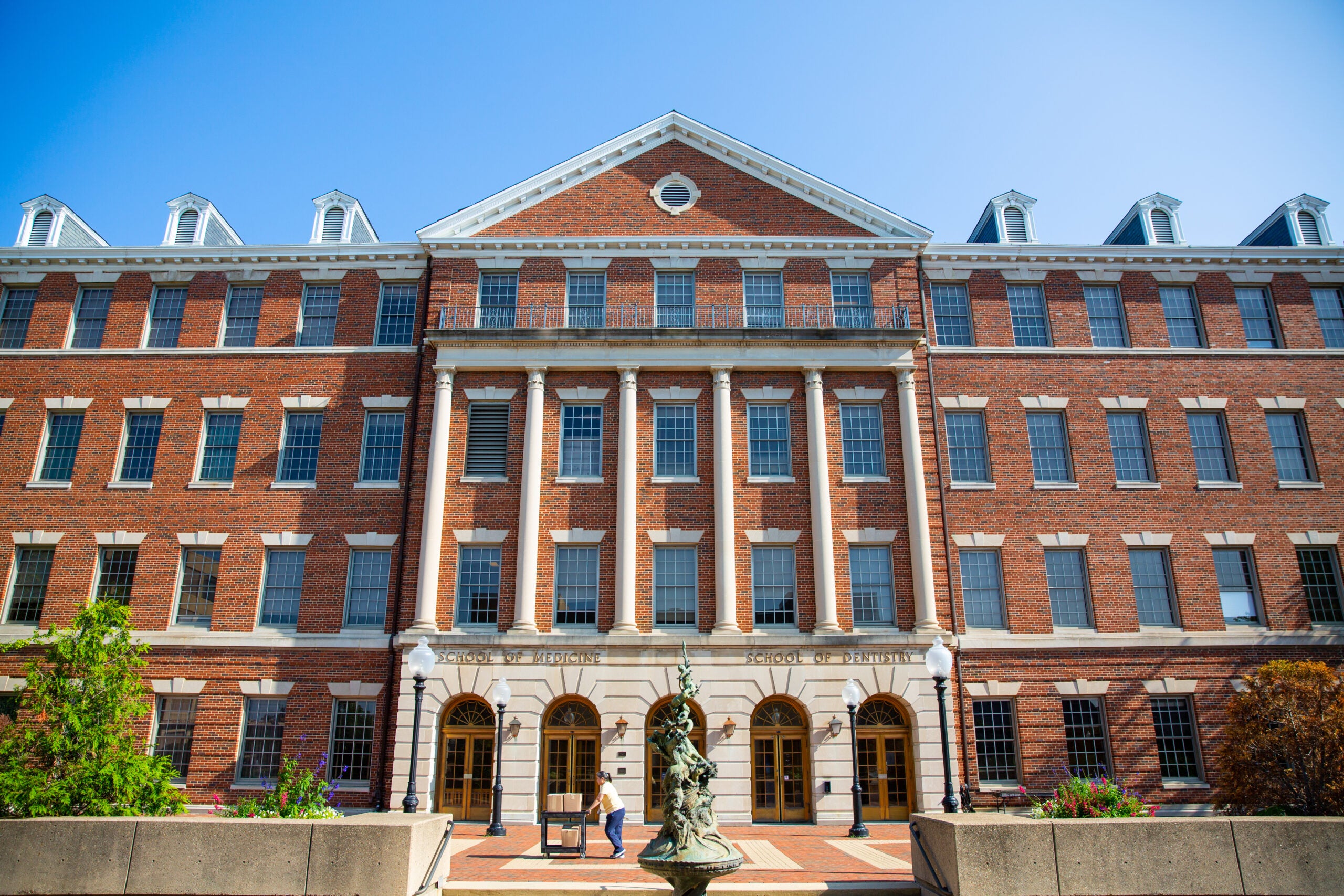 The Med-Dent building facade against a bright blue sky