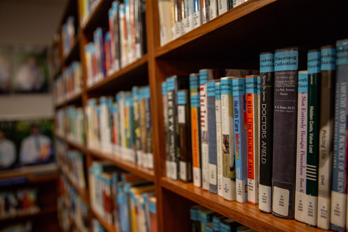 Books line shelves in Dahlgren Memorial Library