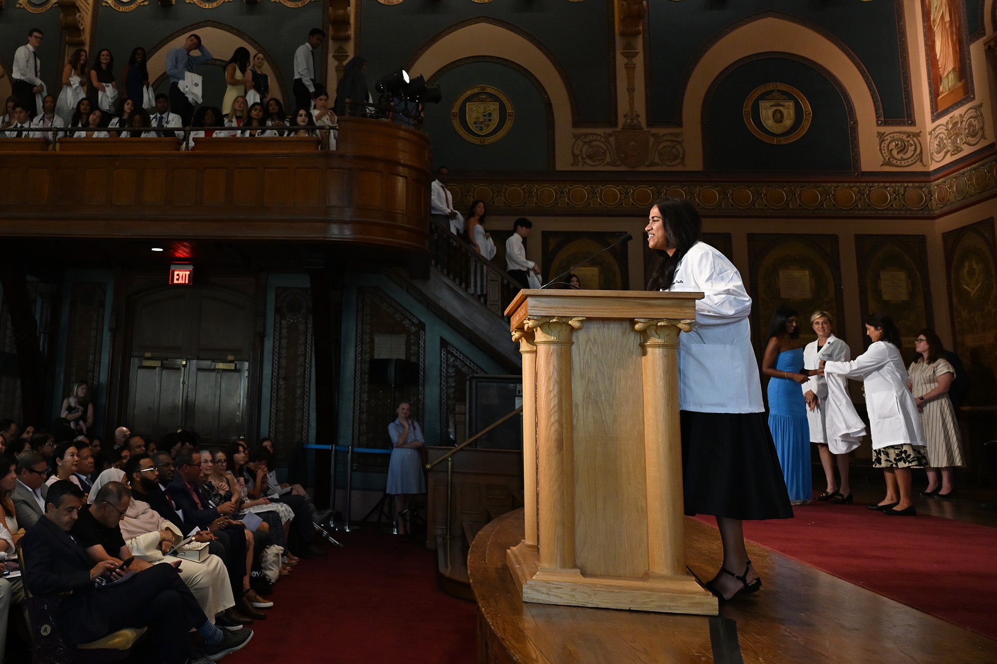 A student speaks from the podium