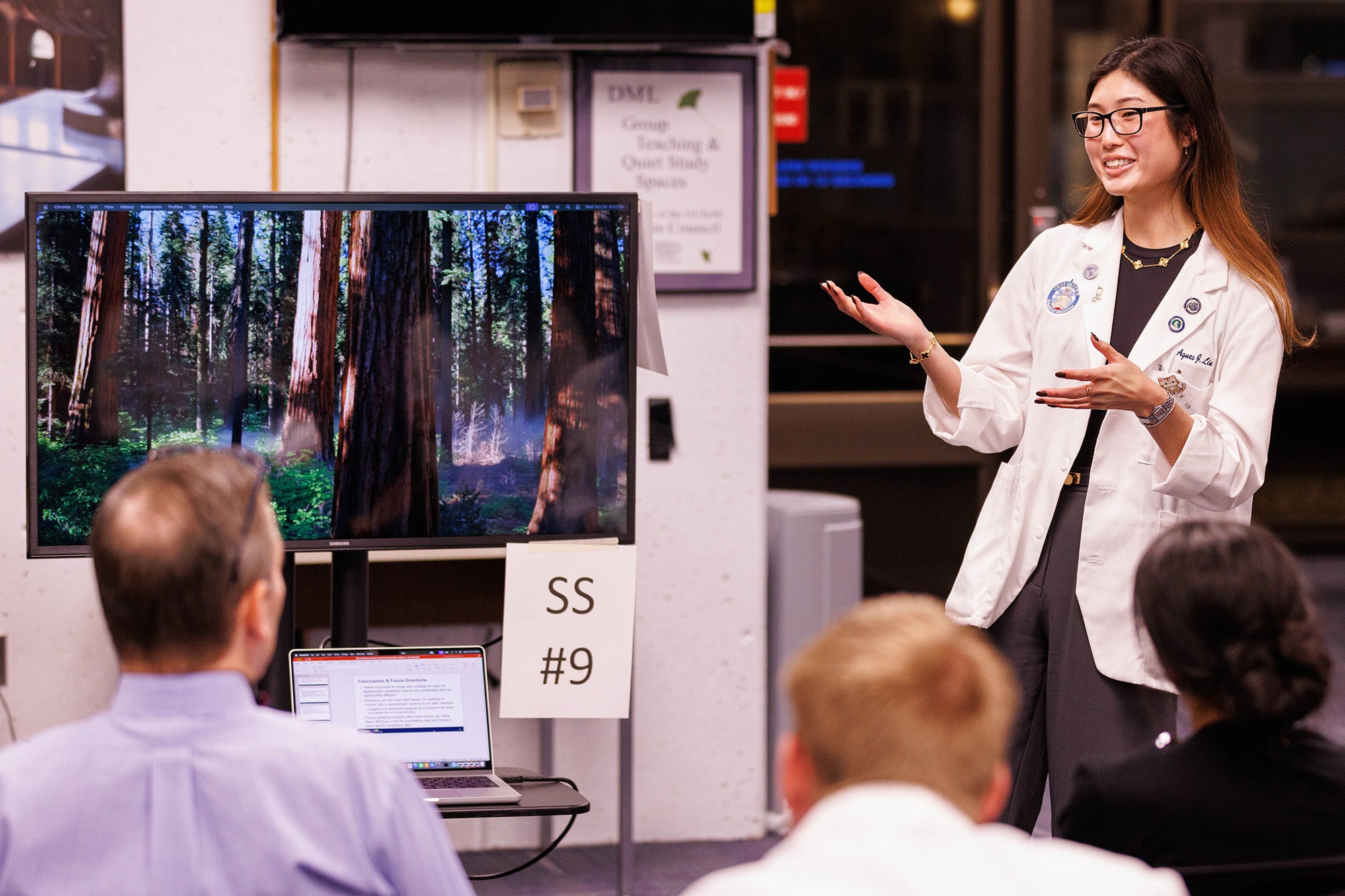 A medical student gives her presentation