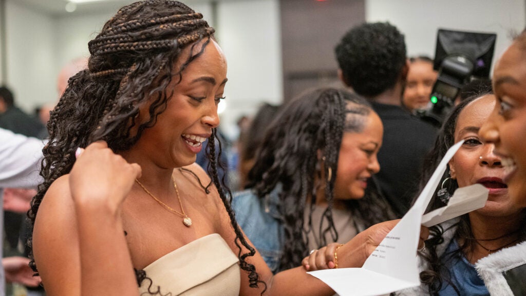 A student reacts with emotion upon reading her Match letter