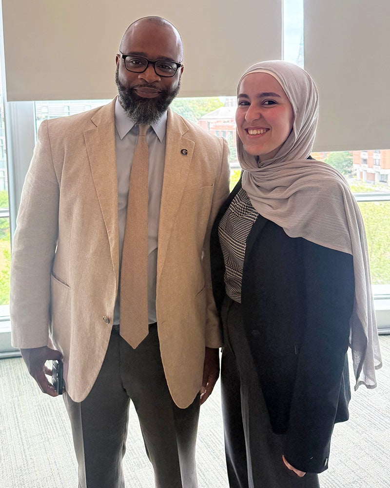 Maisam stands next to Dr. Davis